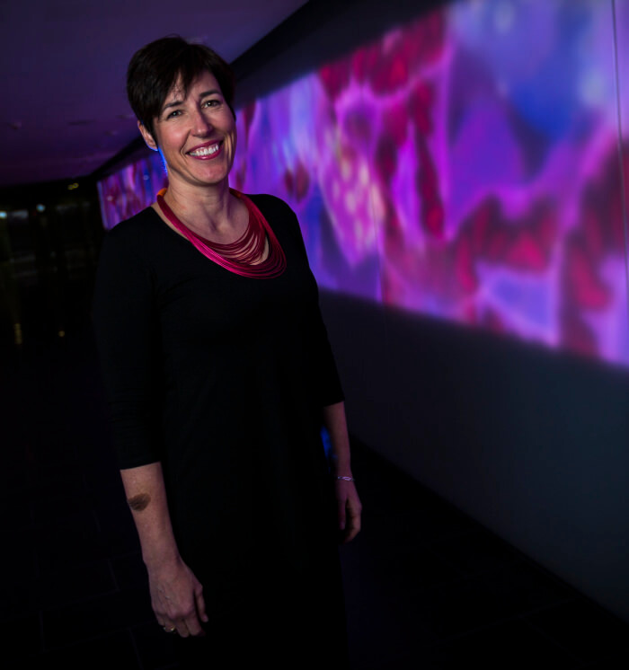 Associate Professor Clara Gaff says our genomic information is the equivalent of 1000 copies of the novel War and Peace. Picture: Chris Hopkins